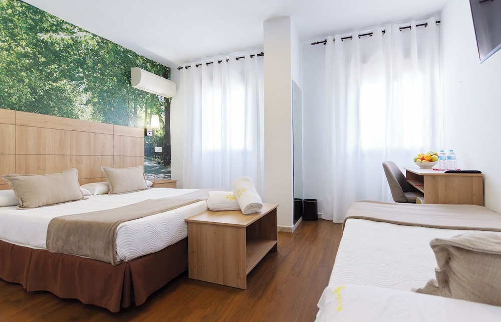 Habitación triple del hotel El Tajo and Spa