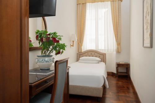 Habitación Individual del hotel Boccaccio. Foto 2