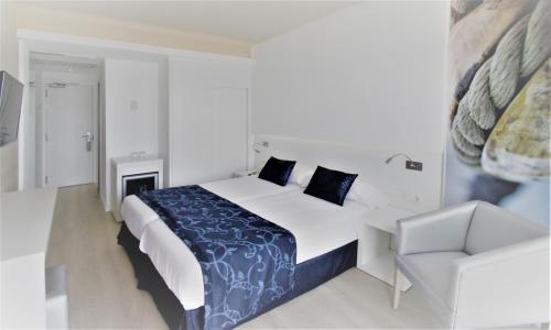 Habitación Triple del hotel BG Java. Foto 1