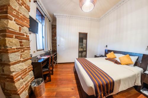 Habitación con cama extragrande. del hotel La Casona Boutique. Foto 8