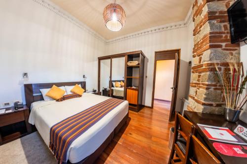 Habitación con cama extragrande. del hotel La Casona Boutique. Foto 9