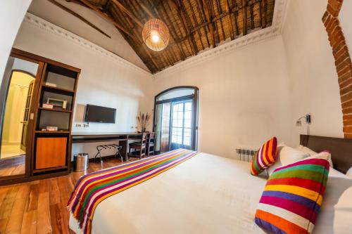 Habitación con cama extragrande. del hotel La Casona Boutique. Foto 12