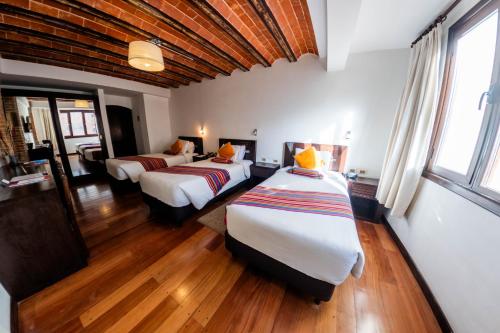 Habitación Triple del hotel La Casona Boutique. Foto 4
