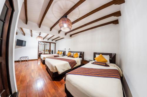 Habitación Triple del hotel La Casona Boutique. Foto 5