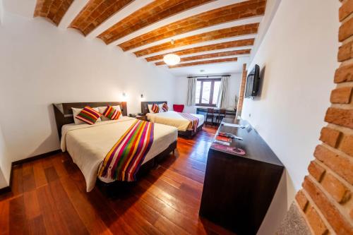 Habitación Doble Superior - 2 camas del hotel La Casona Boutique. Foto 4