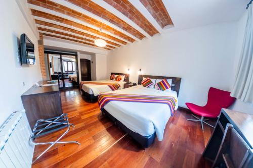 Habitación Doble Superior - 2 camas del hotel La Casona Boutique. Foto 5