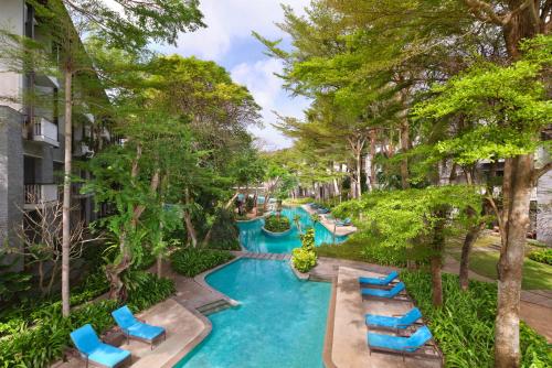 Premium Deluxe King Room with Garden View del hotel Courtyard By Marriott Bali Nusa Dua Resort
