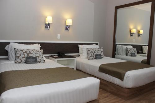Habitación Doble - 2 camas del hotel Plaza Revolución. Foto 2