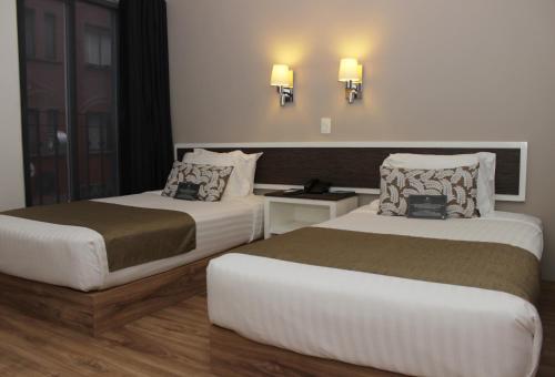 Habitación Doble - 2 camas del hotel Plaza Revolución. Foto 4