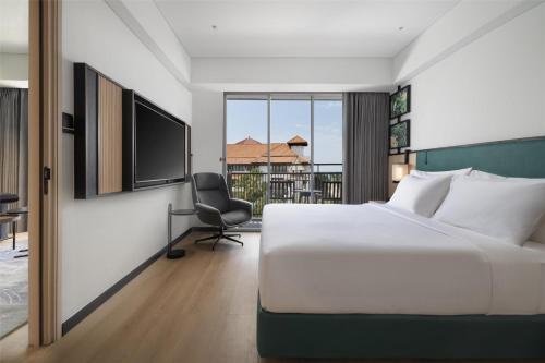 Suite Deluxe con cama extragrande del hotel Ibis Styles Bali Benoa. Foto 2