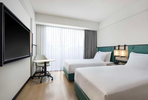 Habitación Doble - 2 camas del hotel Ibis Styles Bali Benoa. Foto 4