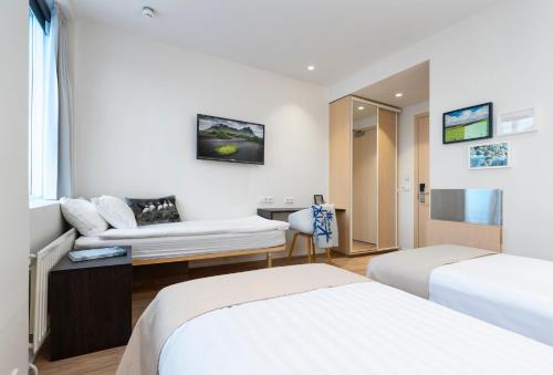 Habitación Triple del hotel Reykjavik Lights By Keahotels. Foto 13