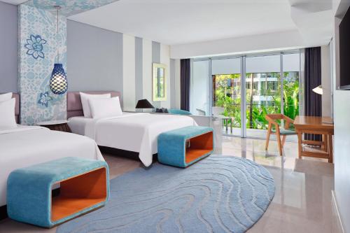 Deluxe Room Twin Bed Lagoon View, Kids Club Access & 2 Minutes Walk To Jimbaran Beach del hotel Le Meridien Bali Jimbaran - Chse Certified. Foto 2