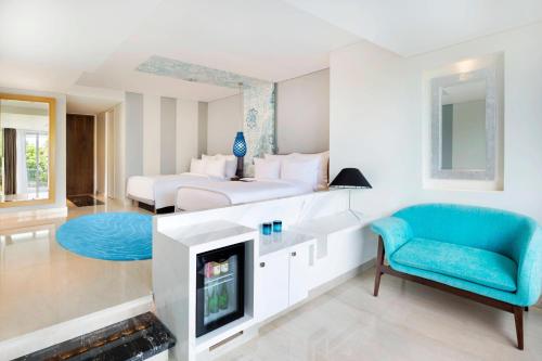 Deluxe Room Twin Bed Lagoon Access, Kids Club Access & 2 Minutes Walk To Jimbaran Beach del hotel Le Meridien Bali Jimbaran - Chse Certified. Foto 1