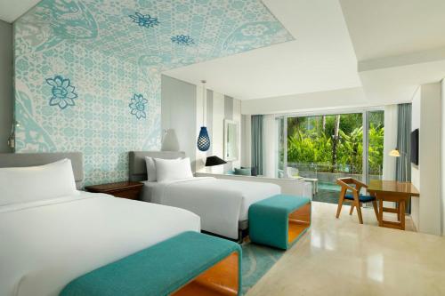Deluxe Room Twin Bed Lagoon Access, Kids Club Access & 2 Minutes Walk To Jimbaran Beach del hotel Le Meridien Bali Jimbaran - Chse Certified. Foto 3