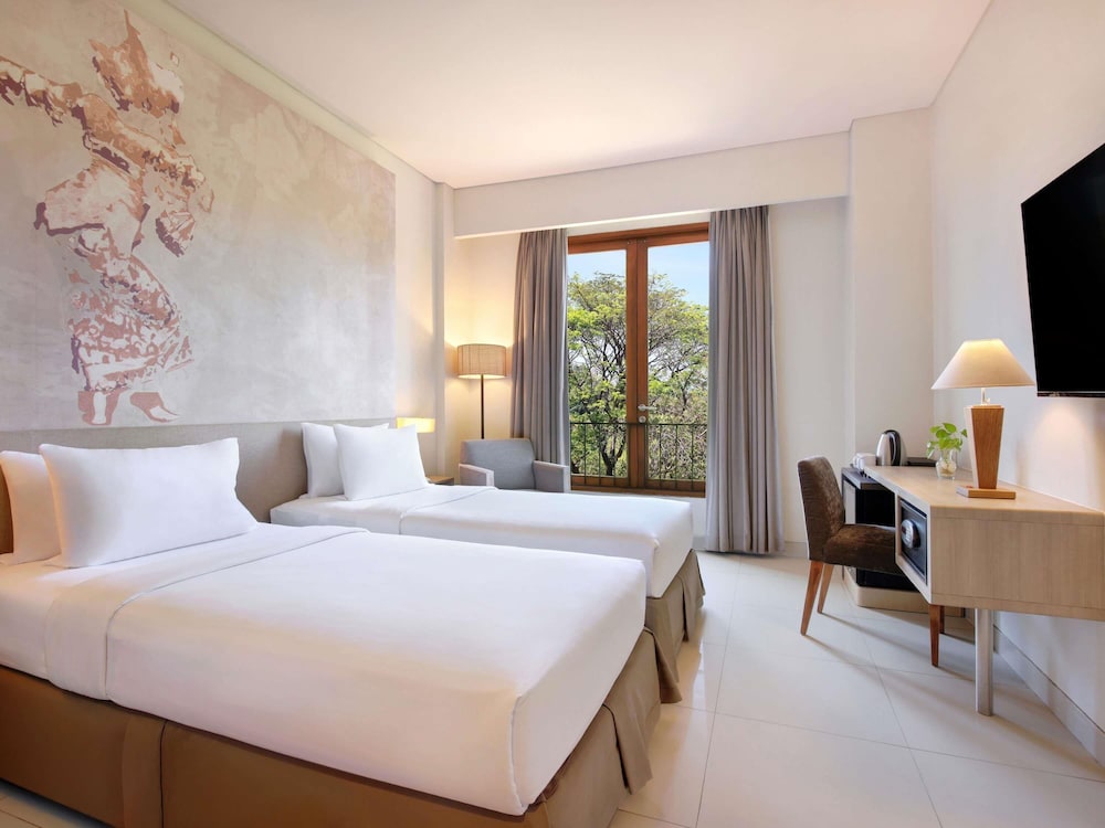 Habitación Superior con Vistas al Jardín y Dos Camas Individuales del hotel Mercure Bali Nusa Dua. Foto 2