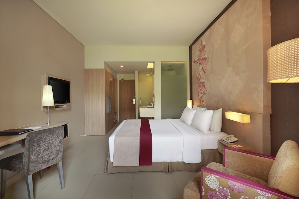 Habitación Superior con Vistas a la Piscina y Cama Doble del hotel Mercure Bali Nusa Dua. Foto 1
