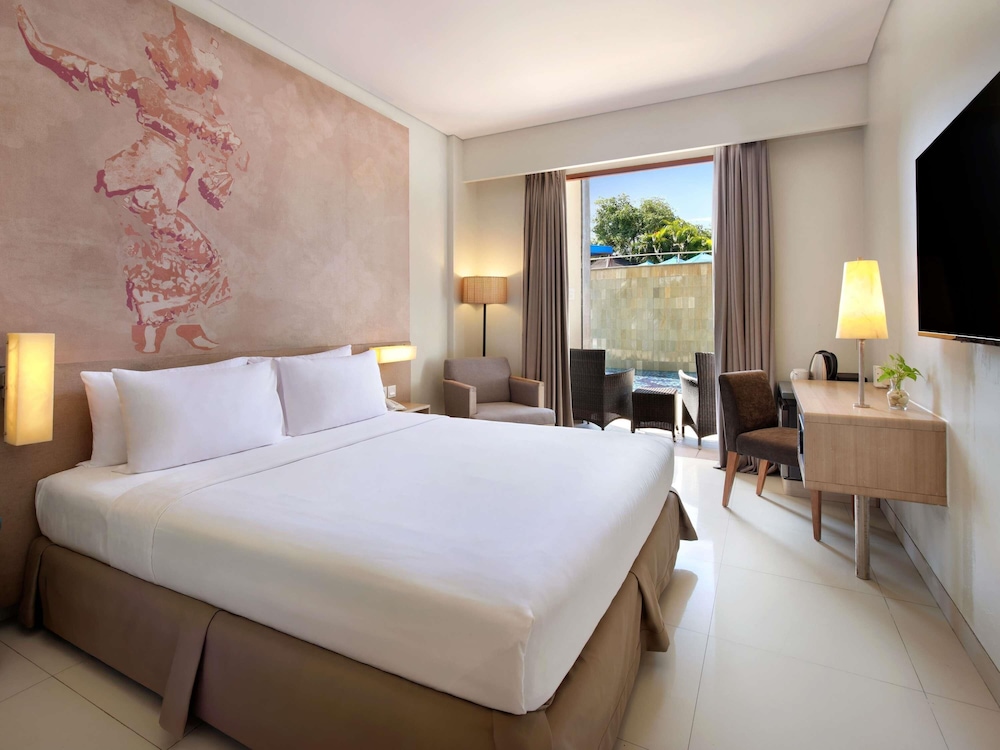 Habitación Deluxe con Cama Doble, Terraza y Vistas a la Piscina del hotel Mercure Bali Nusa Dua
