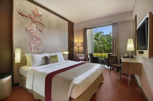 Suite Junior con 1 cama doble y Sofá del hotel Mercure Bali Nusa Dua. Foto 5