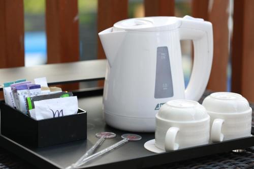 Suite Junior con 1 cama doble y Sofá del hotel Mercure Bali Nusa Dua. Foto 7