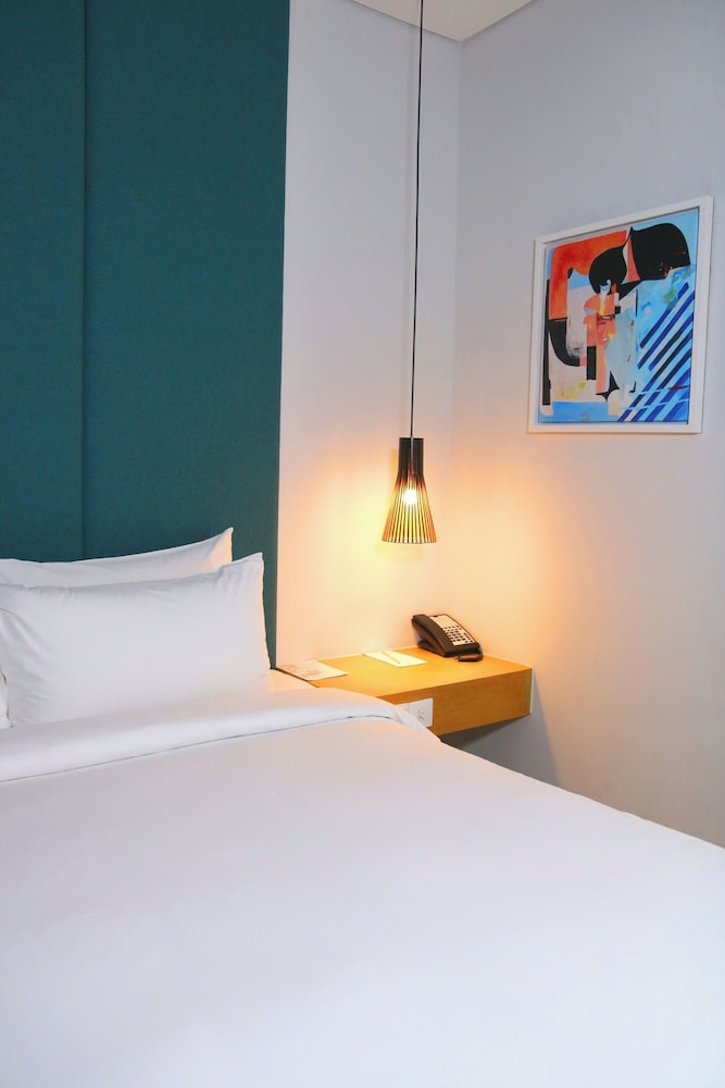 Estudio con 1 Cama King del hotel Novotel Living Saigon South. Foto 1