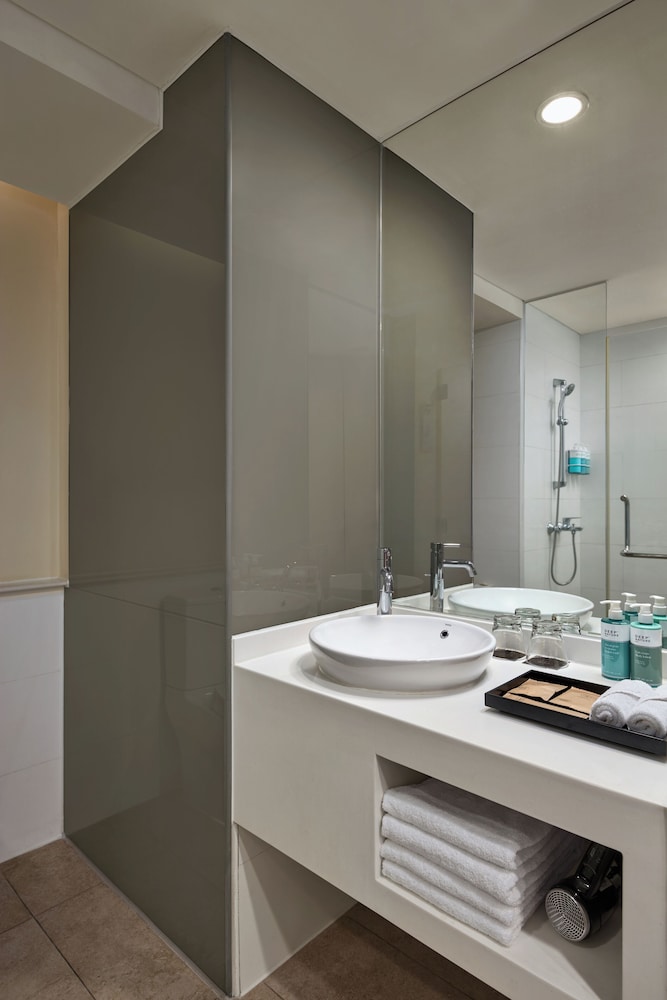Estudio con 2 camas individuales del hotel Novotel Living Saigon South. Foto 5