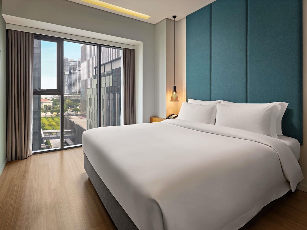 Apartamento Deluxe de un Dormitorio del hotel Novotel Living Saigon South. Foto 8