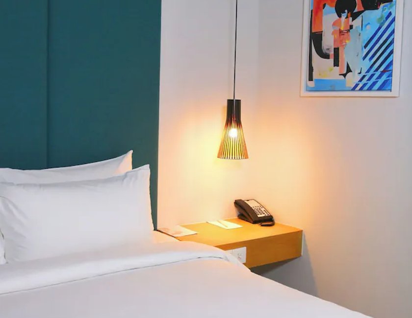 Estudio 1 Cama king Vista ciudad kitchenette del hotel Novotel Living Saigon South. Foto 1