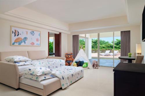 Premium Family Suite, Garden View, 1 King Bed & 2 Sofa Beds (max. occupancy 5 adults) del hotel Sheraton Bali Kuta Resort - Chse Certified