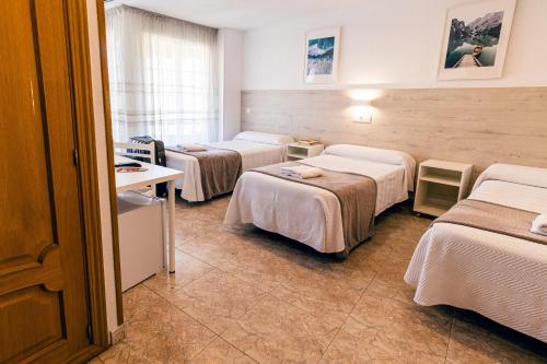 Habitación Triple del hotel Gran Via. Foto 3