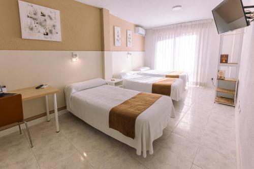 Habitación Triple del hotel Gran Via. Foto 4