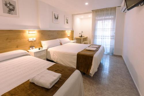 Habitación Doble con Cama supletoria del hotel Gran Via