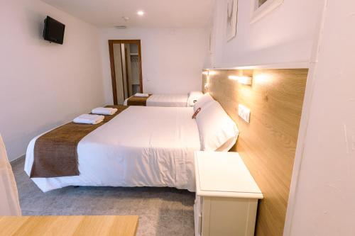 Habitación Doble con Cama supletoria del hotel Gran Via. Foto 1