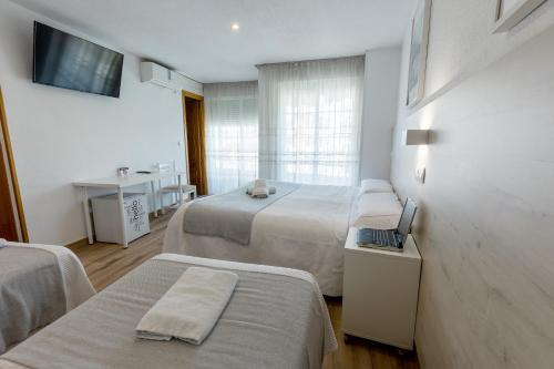 Habitación Cuádruple del hotel Gran Via. Foto 6