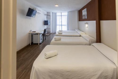 Habitación Cuádruple del hotel Gran Via. Foto 11
