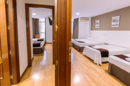 Habitación Familiar del hotel Gran Via. Foto 4