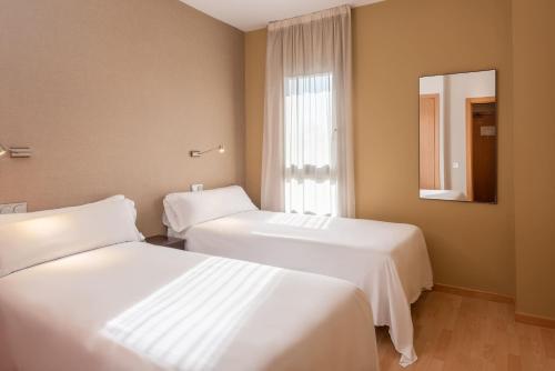 Habitación Familiar del hotel Madrid Airport Suites, Affiliated by Meliá. Foto 3