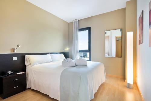Habitación Superior del hotel Madrid Airport Suites, Affiliated by Meliá. Foto 1