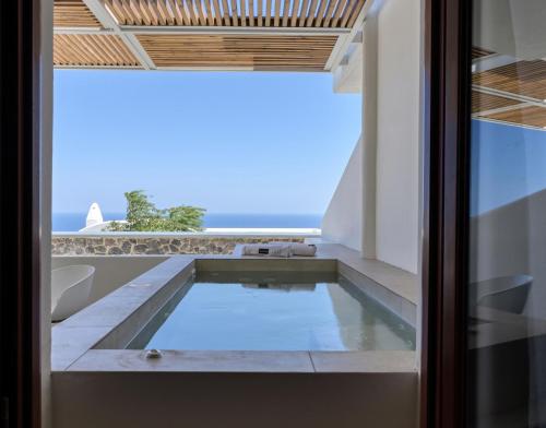 Deluxe suite with outdoor spa bath del hotel Splendour Resort. Foto 7