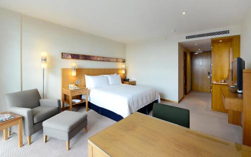 Habitación Deluxe con cama extragrande del hotel Canary Riverside Plaza