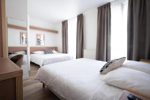 Habitación cuádruple del hotel Edgar Quinet. Foto 1