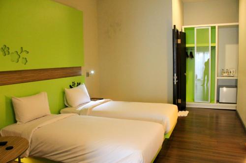Habitación Doble Superior - 2 camas del hotel Ibis Styles Bali Denpasar. Foto 1