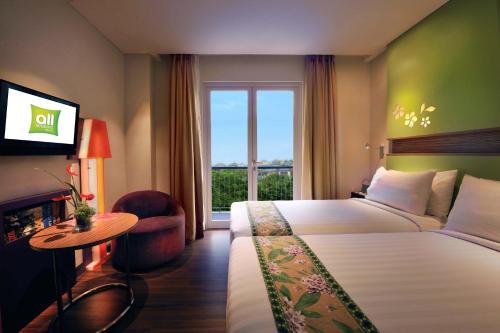 Habitación Doble Superior - 2 camas del hotel Ibis Styles Bali Denpasar. Foto 8