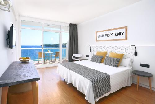 Habitación Doble Premium con vistas al mar y acceso al spa - 2 camas del hotel Spa Flamboyan Caribe. Foto 1
