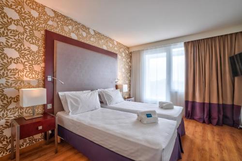 Apartamento de 1 dormitorio del hotel Clarion Paris CDG Airport. Foto 1