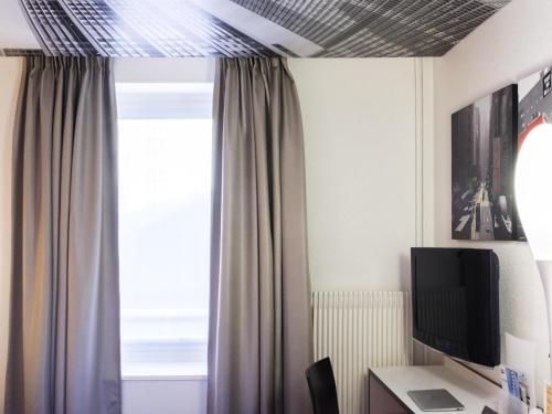 Habitación Doble Estándar - 2 camas del hotel Ibis Styles Strasbourg Centre Gare. Foto 1