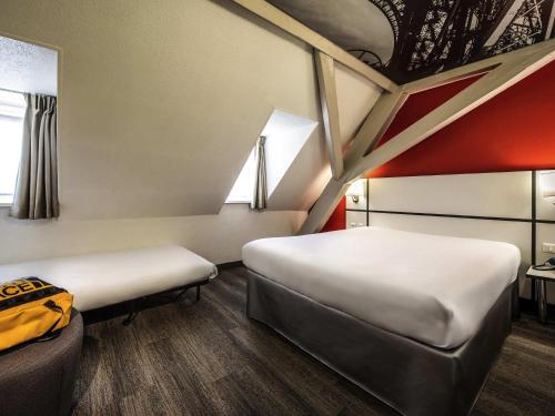 Habitación Doble Estándar con 1 cama individual del hotel Ibis Styles Strasbourg Centre Gare. Foto 2