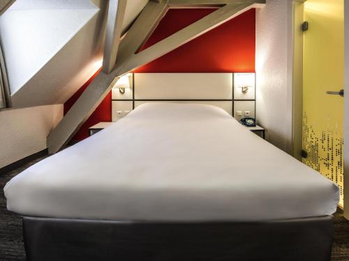 Habitación Doble Estándar con 1 cama individual del hotel Ibis Styles Strasbourg Centre Gare. Foto 5