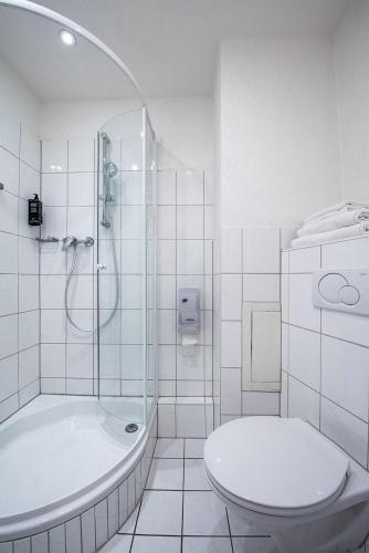 Habitación Doble Estándar con 1 cama individual del hotel Ibis Styles Strasbourg Centre Gare. Foto 8