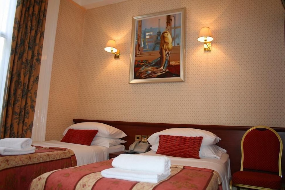 Habitación con 2 camas individuales del hotel Avon